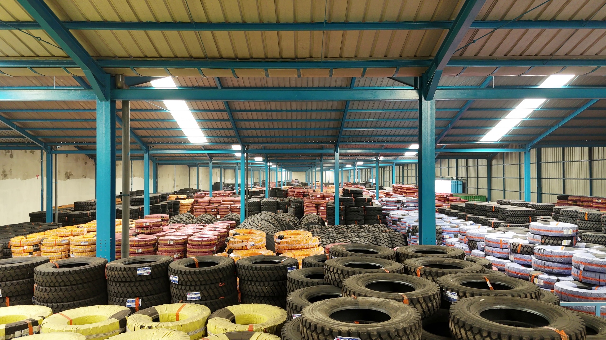 PT. Fie Min Logistics: Mengoptimalkan Rantai Pasok Industri Ban Truk & Ban Alat Berat Melalui PLB